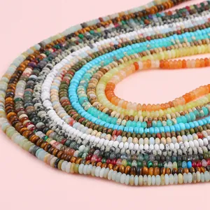 Multiple strands of natural stone saucer beads including tiger eye and turquoise for DIY jewelry