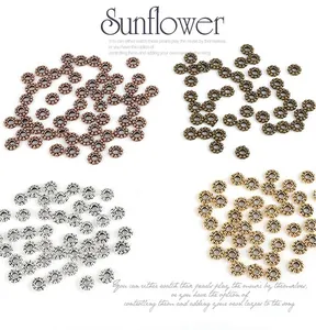 Macro view of sunflower style zinc alloy spacer beads in four metallic finishes for DIY jewelry