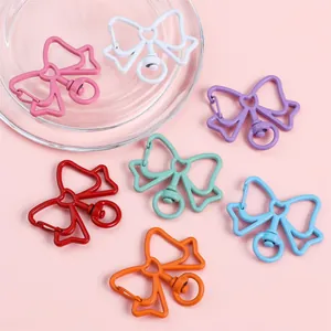 Porte-clés en alliage en forme de nœud aux couleurs pastel pour accessoires bijoux DIY