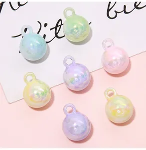 Macro shot of colorful iridescent 16mm acrylic round beads for DIY handmade jewelry crafts