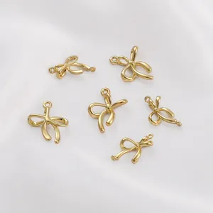 6 ciondoli a fiocco placcati oro 14K con anelli di sospensione per creazione gioielli fai-da-te