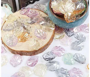 Detailed view of iridescent ABS pearl flower petals with pre-drilled holes for DIY jewelry