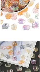 Macro detail of iridescent shell-shaped ABS pearl petals for DIY jewelry making