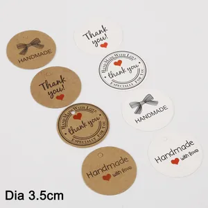 Set of round 3.5cm handmade thank you gift tags in white and brown kraft paper