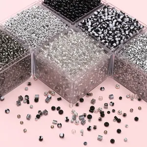 DIY glass seed beads kit with black and silver round and tube beads in a plastic storage box