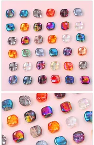 Macro detail of colorful aurora-coated glass rhombic beads for DIY jewelry making