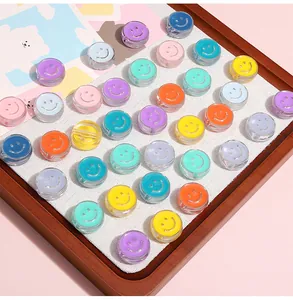 Macro detail of colorful acrylic smiley face beads for DIY jewelry and bracelet making
