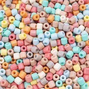 Macro shot of colorful 6x6mm matte cylindrical glass beads for DIY jewelry making