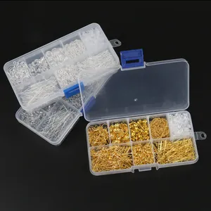 Detailed view of DIY jewelry making kit with gold and silver components in storage box