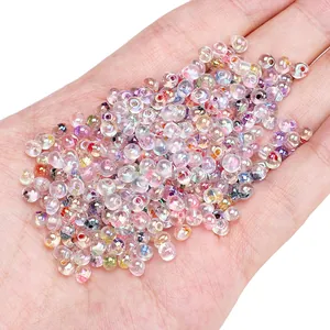 Macro shot of 450g iridescent water-drop glass seed beads for DIY jewelry making