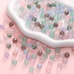 Multicolor 10mm faceted glass beads with unique ink textures for DIY jewelry making