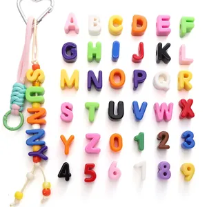 Colorful acrylic alphabet and number beads kit for DIY jewelry with sunny keychain example