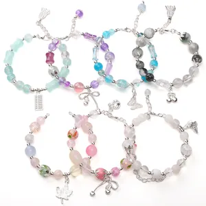 Set of 7 mixed glass bead bracelets with colorful charms for DIY jewelry making