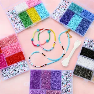 DIY bead set with multi-color seed beads and alphabet beads in five plastic storage boxes