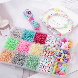 Detail view of 15-grid DIY jewelry kit with colorful glass beads and letter charms