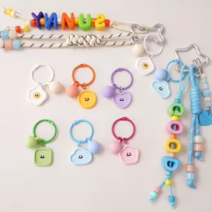 Porte-clés smiley en résine macaron avec perles alphabétiques Sunny et Good