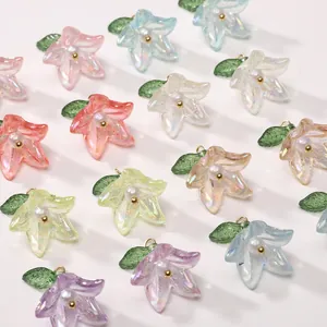 Detailed macro view of colorful iridescent acrylic lily flower beads with white pearls for DIY