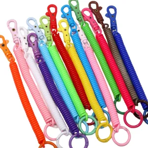 Colorful spiral plastic spring keychain with lobster clasp and ring on white background