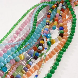Macro shot of colorful cat eye stone beads with silk luster for jewelry making