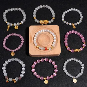 Cat eye bead bracelets with gold Pixiu and fortune charms in nine assorted styles