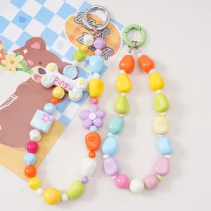 Colorful acrylic beaded phone charms with Pingu bone pendant and green clasp hooks