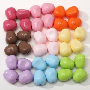 Colorful acrylic corn kernel beads in pastel macaron shades for DIY jewelry making