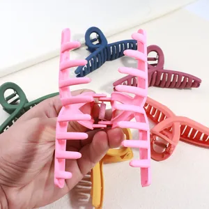 Matte cross-design large shark hair claw clips in assorted colors for thick hair