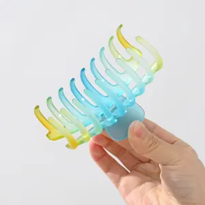 Large hair claw clip with blue-green-yellow gradient and matte finish for women