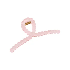 Matte macaron pink beaded shark hair claw clip with golden metal spring for women