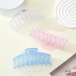 Frosted translucent 11cm hair claws in blue, pink, and white for thick hair styling