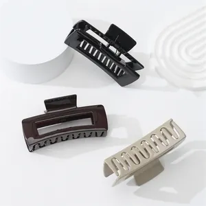 Glossy square hollow hair claw clips set in black, coffee, and beige colors for women