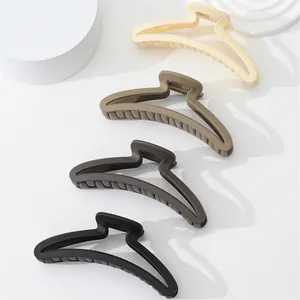 Set de cuatro pinzas para el cabello mate en tonos neutros para cabello grueso