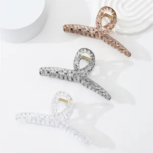 Three-piece diamond-cut crystal texture hair claw clips in neutral shades of amber and grey