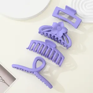 Lot de 4 pinces à cheveux violet mat aux styles floral et géométrique variés