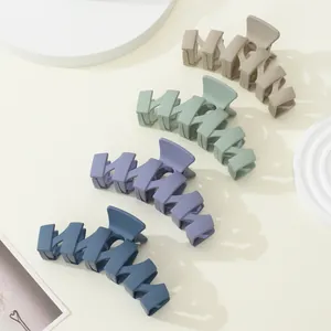 Matte finish large hollow wave hair claws in khaki green purple and navy blue colors