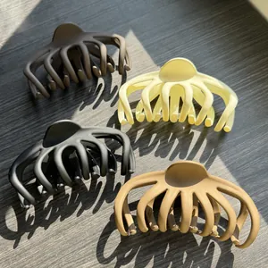 Large octopus hair claws with matte finish in brown beige black and khaki colors