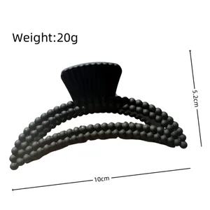 Matte black moon-shaped hair claw clip with ball design, size 10cm x 5.2cm, 20g weight