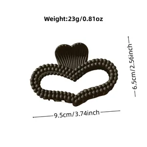 Elegant black heart-shaped hair claw clip with beaded texture for women, 9.5cm size