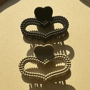 Winter stylish heart shaped bead hair claw clips in matte black and beige plastic set