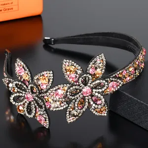 Macro detail of luxury floral headband featuring colorful crystals and anti-slip teeth
