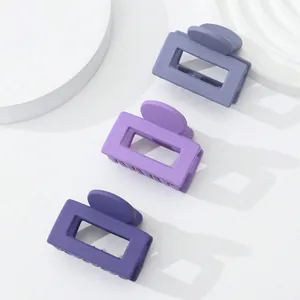 Three-piece set of mini matte purple hair claws with minimalist hollow rectangular design