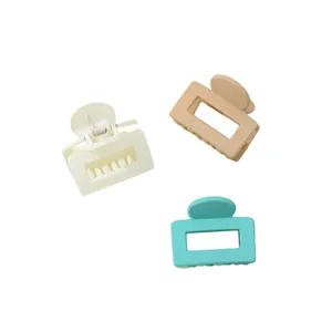 Three-piece set of mini matte square hair claws in cream, tan, and mint green colors