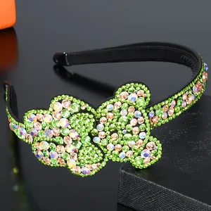 Detailed close-up of rainbow crystal bear headband with anti-slip inner teeth