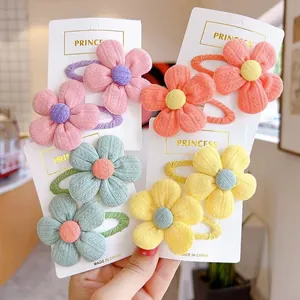 Cute fabric flower hair clips set for girls featuring colorful floral patterns on display cards