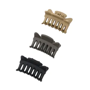 Three-piece set of matte finish hair claw clips in khaki, dark brown and black