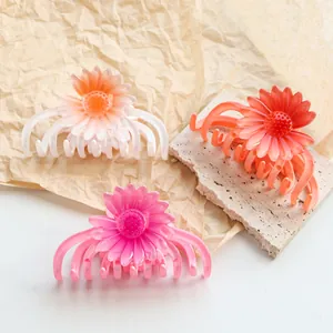 Haarklammern mit Gänseblümchen-Motiv in Rosa, Orange und Weiß aus glänzendem Harz