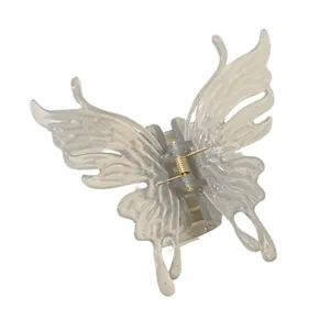 Elegant translucent grey butterfly hair claw clip with golden metal spring for women