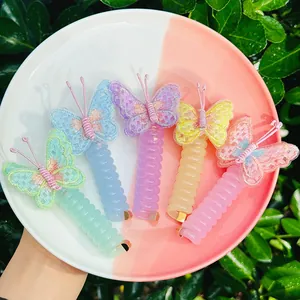 Set de cinq élastiques à cheveux spirale avec nœuds papillon brodés en couleurs pastel