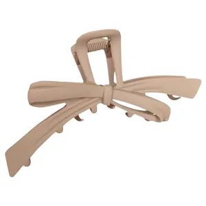 Matte beige Haarklammer mit Schleifen-Design im minimalistischen koreanischen Stil