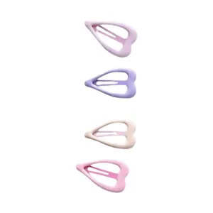 Set of four matte colorful heart-shaped snap hair clips for girls in cream and purple